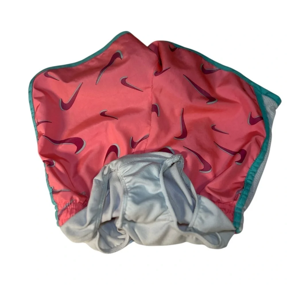 Girls Nike Coral and Teal Dri-FIT Shorts. Size L. (6-7)